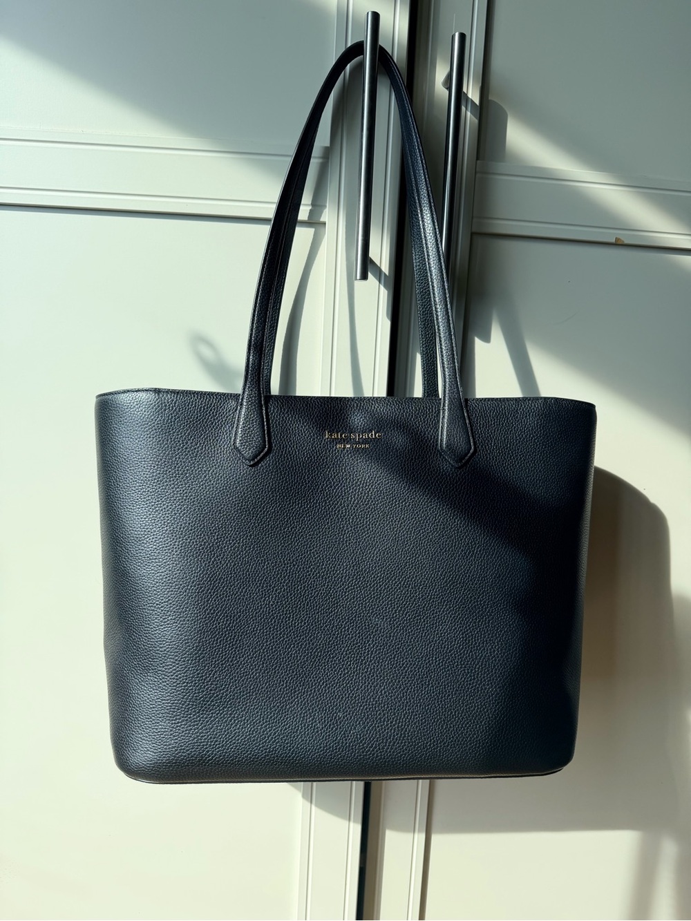 kate spade black pebbled leather shoulder tote with gold logo